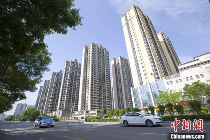 資料圖：車輛從一樓盤前經(jīng)過。 <a target='_blank' href='/'><p  align=
